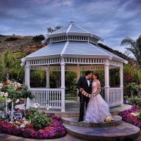 Married couple by gazebo