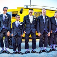 Groom and best men posing